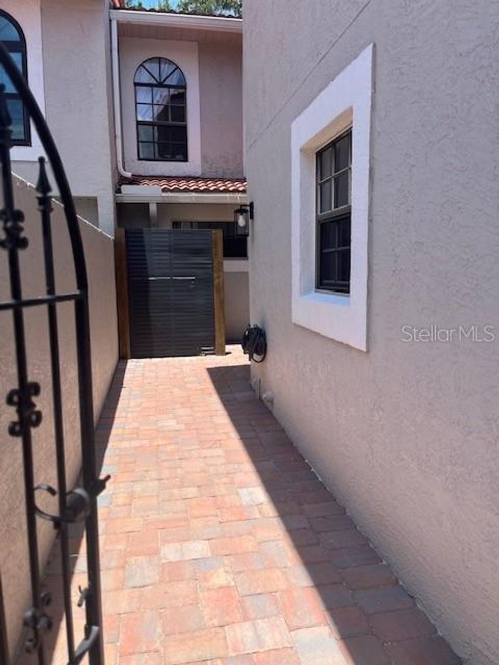 Photo of 8217 Breeze Cove Lane, Orlando, FL 32819 (MLS # O6389651)