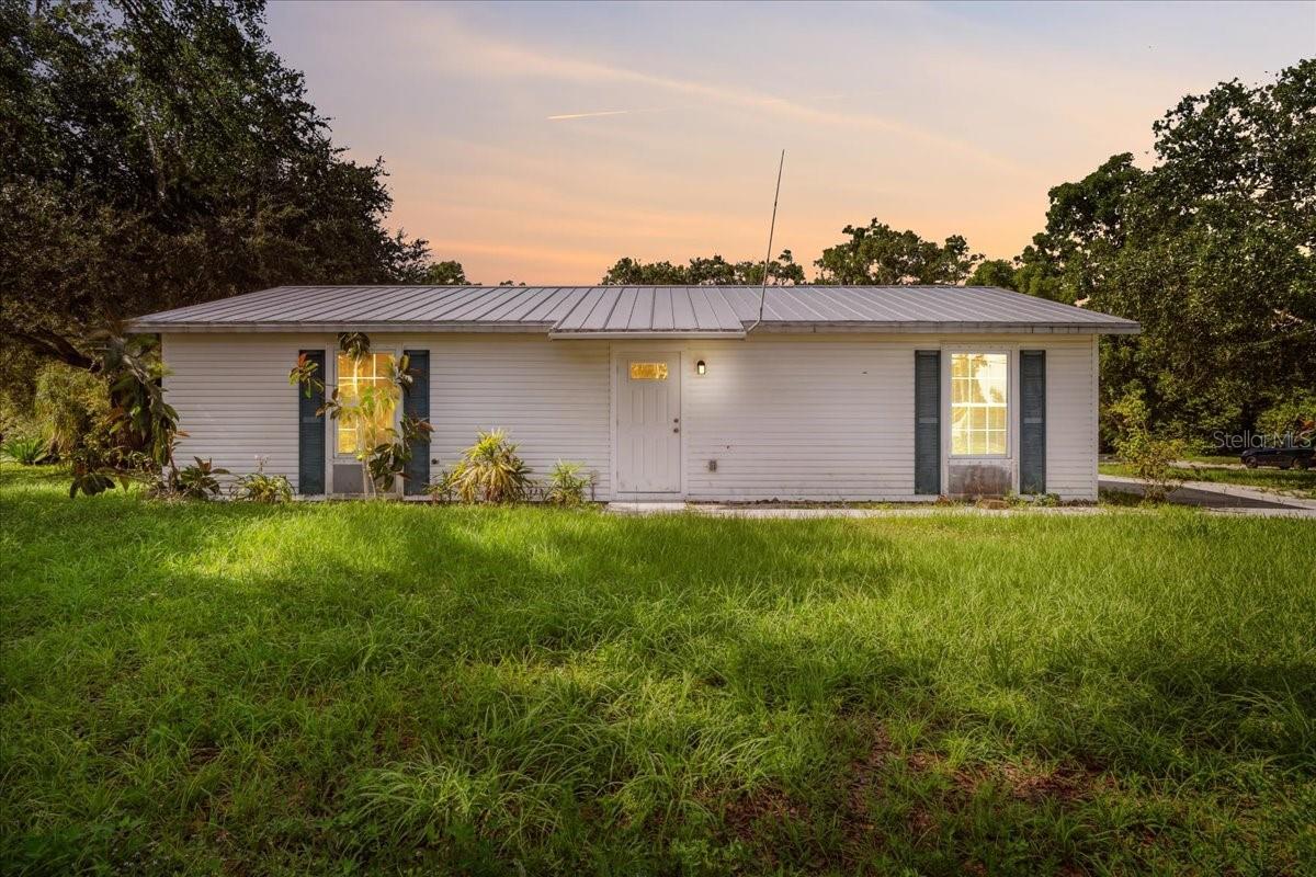 Welcome to this beautifully refreshed 2-bedroom, 1-bathroom home in the heart of historic Arcadia, Florida—an ideal opportunity for investors, first-time buyers, or anyone looking for a laid-back lifestyle with modern comfort. This charming home features fresh interior paint and durable luxury vinyl plank flooring throughout, giving it a clean, updated feel. The kitchen offers solid wood cabinets, and the entire interior has a light, open, and airy atmosphere that invites relaxation and creativity. Whether you’re looking to move right in or add your own finishing touches, this home is a fantastic canvas. Located just five minutes from downtown Arcadia, you’ll be steps away from antique shops, cozy coffee spots, local breweries, restaurants, and boutiques, with community events happening year-round—including vintage car shows and the beloved Watermelon Festival. The home is perfectly situated right down the street from schools, and just two blocks from the hospital, making it both convenient and centrally located. Outdoor lovers will be thrilled with the nearby access to the Peace River, one of Florida’s hidden gems known for boating, kayaking, canoeing, and even fossil hunting. Nearby attractions like the Peace River Campground offer even more outdoor recreation, including riverside camping, and ATV trails. Plus, with easy access to major routes like U.S. 17 and Hwy 70, you’re just over an hour from the beaches of Sarasota or Fort Myers. This is not just a home—it’s an opportunity. Whether you're seeking a long-term investment, a full-time residence, or a vacation escape, this home checks all the boxes: location, potential, and charm. Don’t miss your chance to own a piece of Arcadia’s quiet, welcoming community with small-town vibes and big outdoor adventure. Schedule your showing today and discover the Florida lifestyle waiting for you.