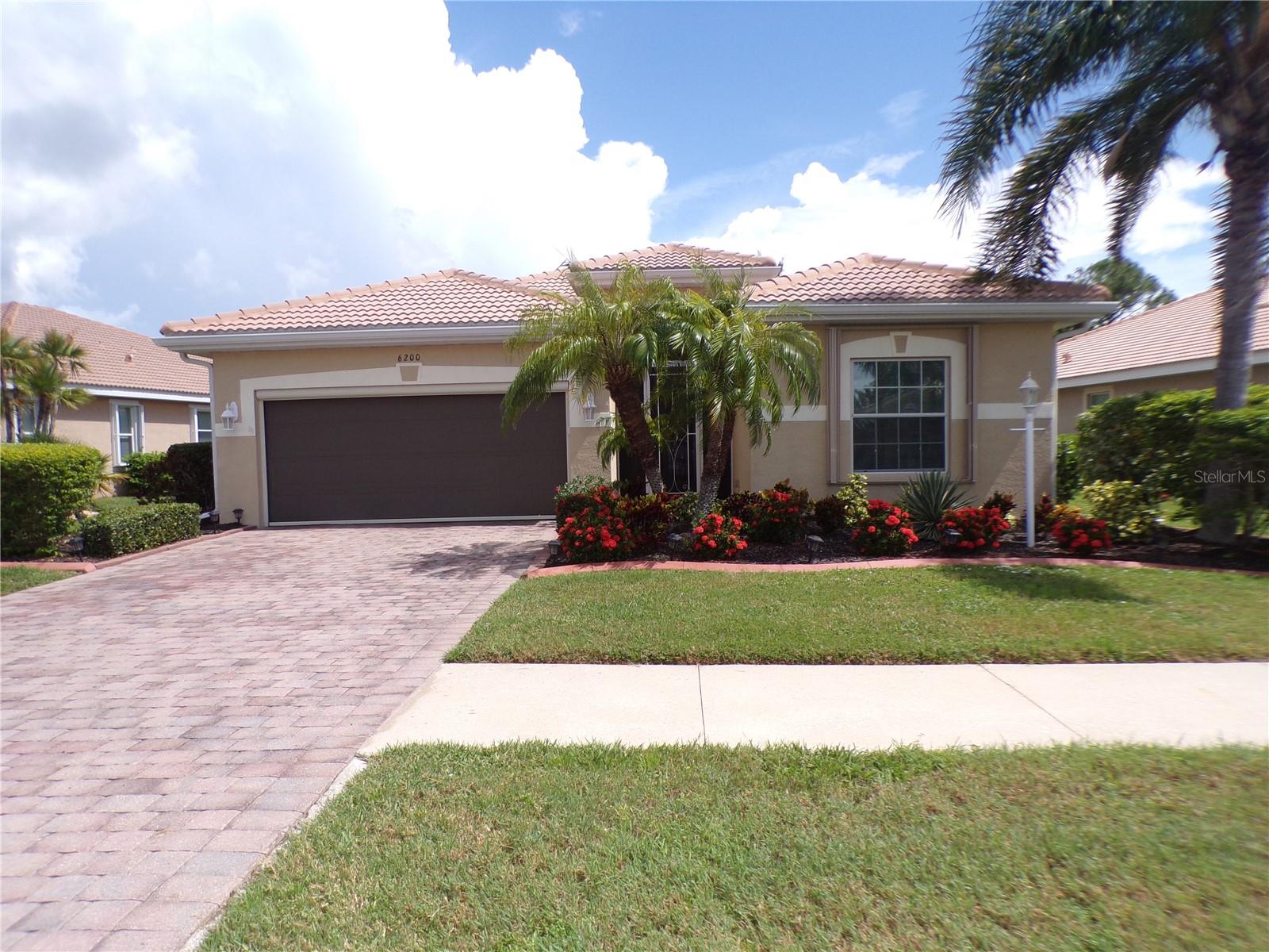 IMMACULATE 3/2 SOLAR POWERED ANNUAL RENTAL located in the Gated Community of TALON BAY just 5-8 Minutes South of River Road/US 41 and Wellen Park in Venice. Open, split bedroom floor plan features Kitchen w/Granite Eating Bar, white Cabinetry, Breakfast Area and Pantry Closet; Open Living/Dining Room with sparkling white Tile Flooring, Crown Moldings, Designer Paint and Slider to Screened Lanai w/Views of Oak Trees and Tennis/Pickleball Courts off in the Distance. Primary Suite w/His and Her Wal-in Closet, 5-Piece Master Bath w/Double Vanity, Soaking Tub and Linen Closet; 2 Nice Sized Guest Bedrooms, Hall Bath w/Tub and Shower, Laundry Room w/Sink, Good Sized Garage w/Attic Storage; Portable Whole House Gas Generator Wired to Run Everything, Newer 2020 $30K Solar Powered Electric System for Low Electric Bills, Water Softener, UV & Security Window Film on all Windows, Hurricane Storm Shutters, Irrigation System. Community Features: Secure Gated Access, Gorgeous Resort Clubhouse overlooking Lake, Huge Pool, BBQ, Party Club Room, Tennis Courts, Fitness Center and Library. BASIC CABLE AND INTERNET included. Ecowater Filtration System, LOW FPL bills from solar panels - SMALL pet considered - DONT MISS THIS ONE!