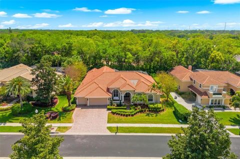 Photo of 1560 Canopy Oaks Boulevard, Palm Harbor, FL 34683 (MLS # TB8485340)