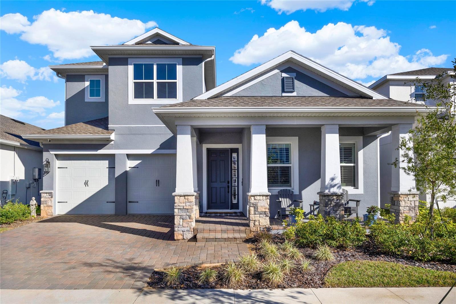 Welcome to this exceptional luxury home in the highly sought-after Osprey Ranch community, where modern living meets cutting-edge technology.
Built in 2024, this stunning 4-bedroom, 3.5-bathroom residence offers 3,225 square feet of meticulously designed space, combining comfort with sophistication.
Set on a spacious 50-foot lot, enjoy breathtaking water views from nearly every room, including the gourmet kitchen featuring top-of-the-line appliances, custom cabinetry, and a sprawling quartz island perfect for entertaining.
The open-concept layout seamlessly flows into the inviting living areas and out to the covered lanai, where panoramic water views create the perfect backdrop for Florida’s stunning sunsets.
This home is equipped with high-end finishes, including plantation shutters, motorized blinds, custom closet organizers, decorative wall panels, and epoxy garage flooring. Notice the home showcases a design inspired by modern farmhouse aesthetics with luxury vinyl Almond Oak flooring throughout.
Advanced smart home systems enhance convenience, security, and entertainment throughout the space.
The primary suite, along with two additional bedrooms, are conveniently located on the first floor. Upstairs, you'll discover a spacious loft, currently transformed into the ultimate media room, perfect for relaxation and entertainment.
The home is fully equipped for a tech-savvy lifestyle, with integrated network systems, wired surveillance cameras, and premium smart devices, ensuring ease and efficiency at every turn.
Nestled in a community offering resort-style amenities such as a playground, dog park, upcoming community pool and cabana, and scenic walking and biking trails, this home is just minutes from downtown Winter Garden, Horizon West, and a variety of world-class dining and shopping options.
With quick access to major roads, top-rated schools, and Walt Disney Theme Parks, you’re in the heart of Central Florida’s most desirable locations.
This is more than just a home; it’s a lifestyle. Don’t miss this rare opportunity to own a completed luxury residence in one of Winter Garden’s most coveted neighborhoods. Schedule your private tour today!