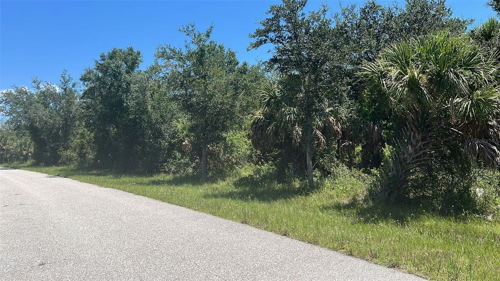 Photo of 7262 Riverton Circle, Port Charlotte, FL 33981 (MLS # O6336336)