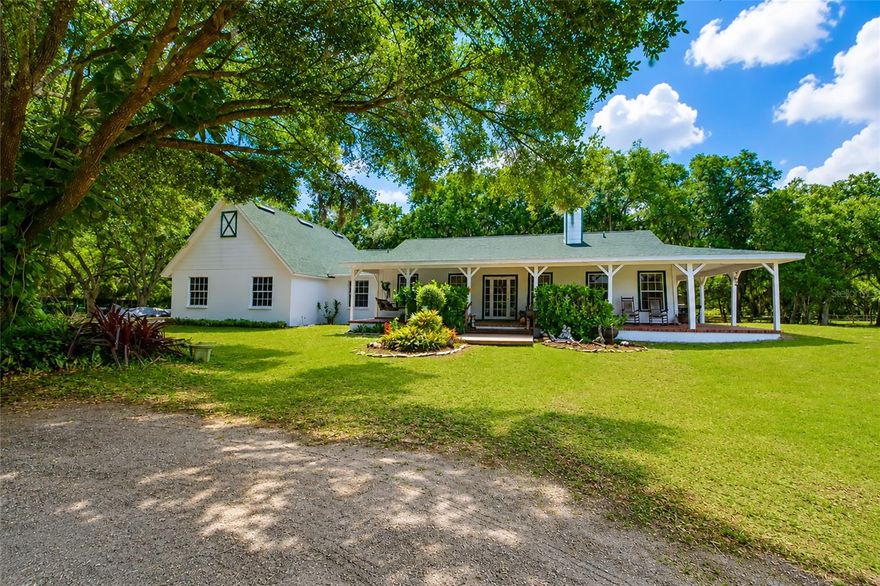 Experience country living with both privacy and comfort with this exceptional 5.18-acre home located in the highly desirable but rarely available Mossy Hammock community. Tucked away at the very end of the community on a quiet dead end setting, this beautiful oak-lined property is surrounded by hundreds of acres of protected conservation easement land and bordered by a large local grower farm behind the property, creating an incredibly private and peaceful retreat with breathtaking Old Florida scenery. Built with durable concrete block construction and lovingly maintained by its original owners, this spacious 3 bedroom, 2 bathroom home offers just under 2,000 square feet of living space with raised ceilings and an open layout that makes the home feel even larger. Natural light pours throughout the interior, enhancing the warm and inviting atmosphere while showcasing the tranquil views of the surrounding acreage and majestic mature oak trees. Have peace of mind with a NEW ROOF INSTALLED IN 2024 and a NEW HOT WATER HEATER INSTALLED 2025. To further reassure buyers, the SELLER'S HAVE COMPLETED A PRE LISTING 4 POINT INSPECTION AND A CLEAN 4 POINT REPORT IS ATTACHED TO MLS. For buyers searching for flexibility and future potential, this property also offers the opportunity to add a 4th bedroom and expand the air-conditioned living space, making it ideal for growing families, multigenerational living, a home office, hobby space, or additional guest accommodations. The Agricultural zoning makes this property especially attractive for buyers seeking a true country lifestyle without sacrificing convenience. Bring your horses, chickens, goats, and other feathered or furry friends while still having plenty of room for your RV, boat, trailers, work equipment, ATVs, golf carts, and all your recreational toys. With wide open usable acreage, this property is ideal for homesteading, gardening, hobby farming, outdoor entertaining, or simply enjoying wide-open space and nature.
This rare acreage home combines many of today’s most sought-after real estate features including:
• Concrete block construction
• High ceilings and spacious floor plan
• Room to expand
• Agricultural zoning
• No cramped suburban living
• Space for RV and boat parking
• Horse-friendly property potential
• Peaceful conservation views
• Ultimate privacy with no rear neighbors
Properties offering this level of privacy, usable land, mature oak trees, conservation surroundings, and future potential are becoming increasingly difficult to find in today’s Florida real estate market. Whether you are searching for a private family estate, hobby farm, equestrian-friendly property, country retreat, or simply more freedom and space to enjoy life, this exceptional Mossy Hammock property delivers a rare opportunity to own your own slice of paradise.