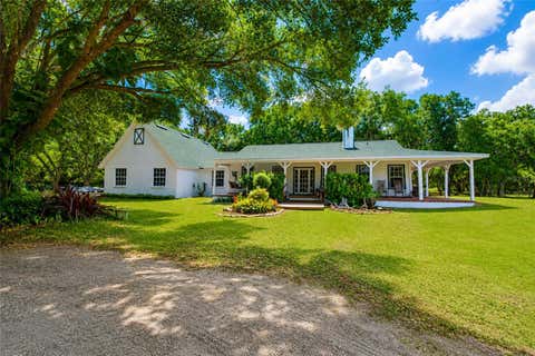 Photo of 14705 Mossy Hammock Lane, Myakka City, FL 34251 (MLS # A4694074)