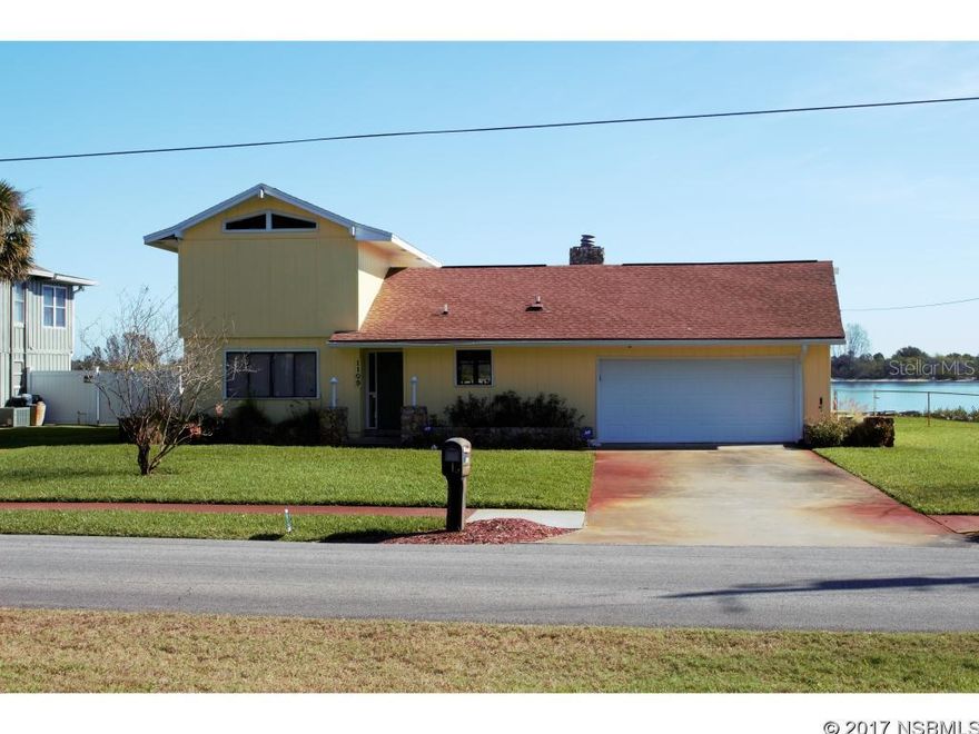 Own your own little slice of paradise!  This home is a must see! You will feel the serenity.   Watch the sunrise, dolphins and boats go by from one of the two over-sized patios.  This 3/2 pool home sits on a large, beautifully landscaped lot right by the river.  Boat dock has new electric and water lines. Volume ceilings, fireplace, separate dining room, extra large master bedroom w/walk in closet and sunny office with breathtaking views makes this the perfect home for work and play.  Two car garage is air conditioned, for the projects, repairs or alternate use.  BRAND NEW ROOF! ;Water: City