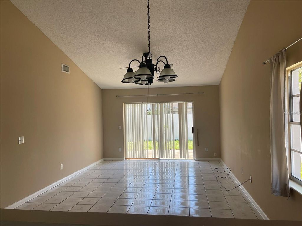 Photo of 13148 San Antonio Woods Lane, Orlando, FL 32824 (MLS # O6384424)