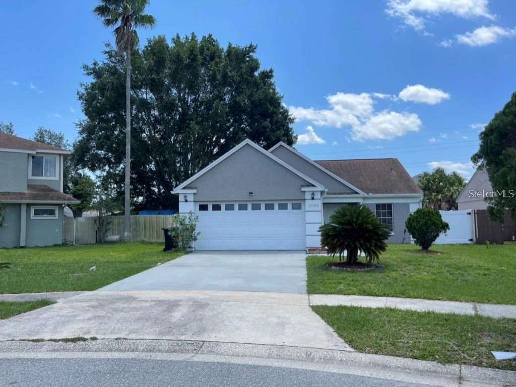 Photo of 13148 San Antonio Woods Lane, Orlando, FL 32824 (MLS # O6384424)