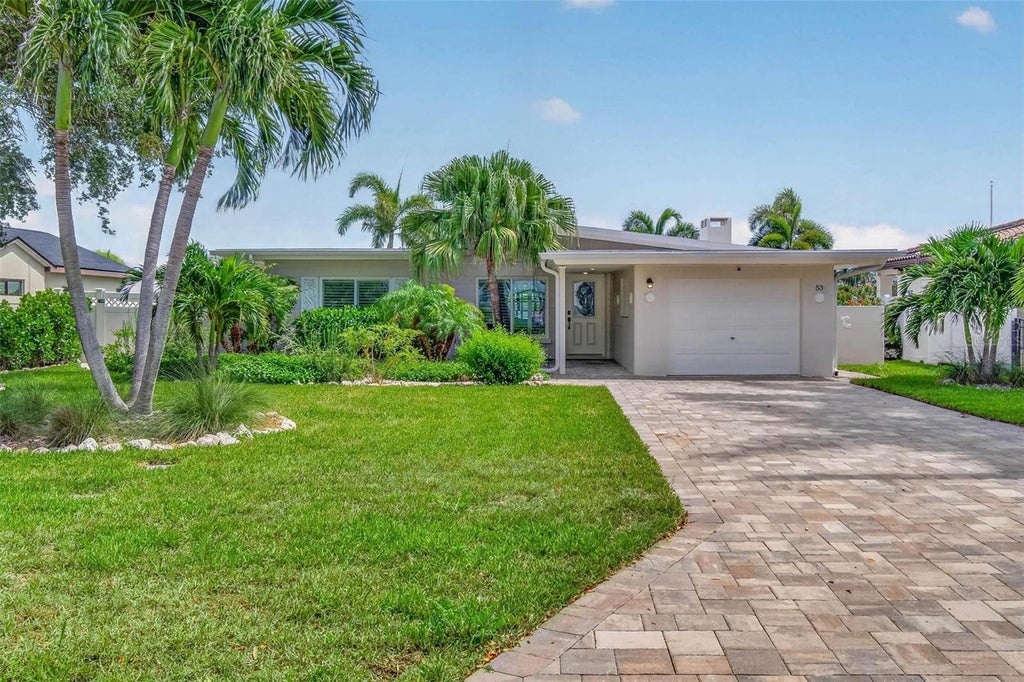 Photo of 53 Dolphin Drive, Treasure Island, FL 33706 (MLS # TB8549187)