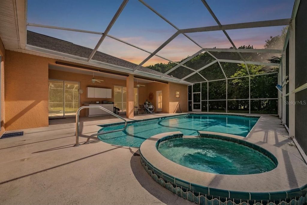 Photo of 13566 Rudi Loop, Spring Hill, FL 34609 (MLS # TB8497248)