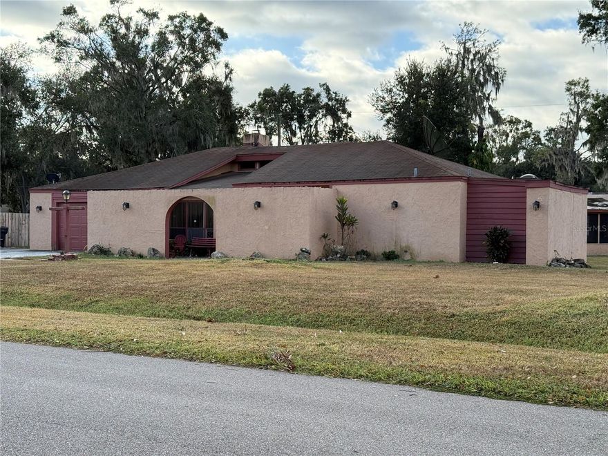 This is a rare find, 3 bed / 2 bath home with roughly 1,967 sq ft of living space on just under a ½-acre lot. Built in 1980, this masonry/stucco home boasts solid bones, featuring a hip roof, attached garage space, and plenty of room to roam outdoors. 

While it does need some cosmetic refreshes and mechanical updates, this is the kind of home where sweat equity can pay big dividends. Inside, generous bedrooms, multiple living zones, and a functional floor plan give you a canvas to re-imagine. Outside, the yard offers privacy, mature trees, and space for gardens, expansion, or even a pool.

Close to schools, shopping, and major roadways, it’s a desirable central location in Mulberry. Bring your vision, roll up your sleeves, and capitalize on this rare opportunity in a price band where few homes with this footprint exist.