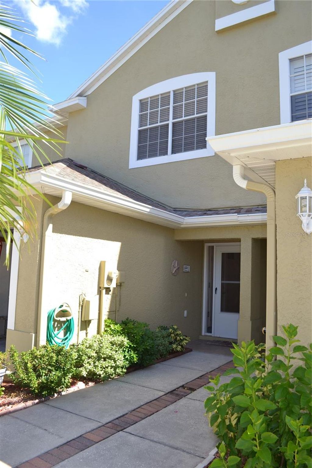 Photo of 11135 Kapok Grand Circle, Madeira Beach, FL 33708 (MLS # TB8439392)
