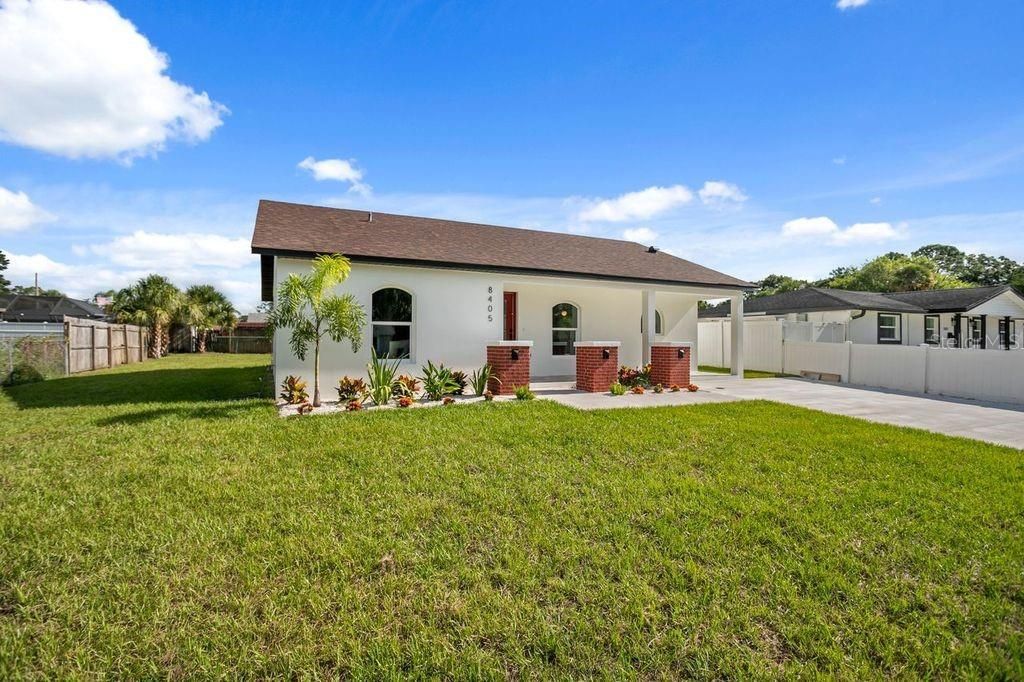 Photo of 8405 Woodlake Drive, Tampa, FL 33615 (MLS # TB8419378)