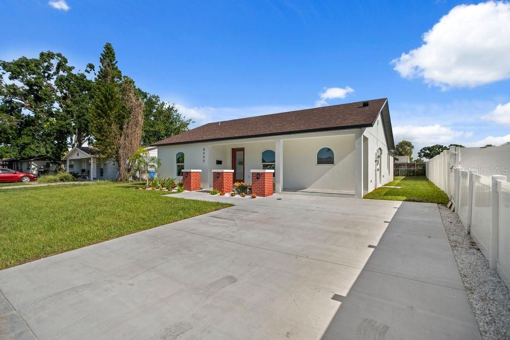 Photo of 8405 Woodlake Drive, Tampa, FL 33615 (MLS # TB8419378)