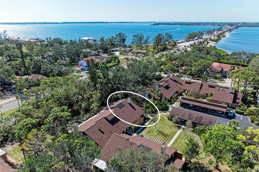 Welcome to your new coastal townhouse at Pine Bay Forest. This TREEHOUSE model is one of PINE BAY FOREST FINEST floorplans! You will appreciate the multitude of customized upgrades in this 3-bedroom 2 bath end unit with carport. This unit is perfectly situated and offers both privacy and tranquility and is only steps from the horses at the causeway beach and 5 miles from gorgeous sandy beaches on Anna Maria Island. As you enter you are greeted by a spacious foyer which opens to the living room and dining area featuring vaulted ceilings, wood burning fireplace and tons of natural light from the windows, two lanais and interior garden atrium. Relax at the end of the day by listening to the fountain in the interior garden atrium or watching the candles flicker in your wood burning fireplace! The kitchen is sure to please the chef in the family, offering wood cabinets, granite counters and new stainless-steel stove, refrigerator and microwave oven which are 2 years new. This property is offered turnkey furnished for your convenience. PINE BAY FOREST is the best in Florida condo living with the location being the first on mainland Bradenton from Manatee Ave/SR 64 access to the world renown beaches of Anna Maria Island! Enjoy the bike ride to the beach for a day or of shopping the island boutiques, eating seafood in the waterfront restaurants or swimming in the Gulf of Mexico. The convenient location offers an easy drive to hospitals, Ringling Museum, IMG Academy, SRQ airport and Sarasota's arts/entertainment district. Although, you may never want to leave the community with all the amenities which include heated swimming pool, sauna, hot tub, tennis courts, shuffleboard and a community deck overlooking Palma Sola Bay to watch sunsets! ** Property information received from third-party sources is considered reliable but is not guaranteed. All information should be independently verified by buyers and buyer's agent.