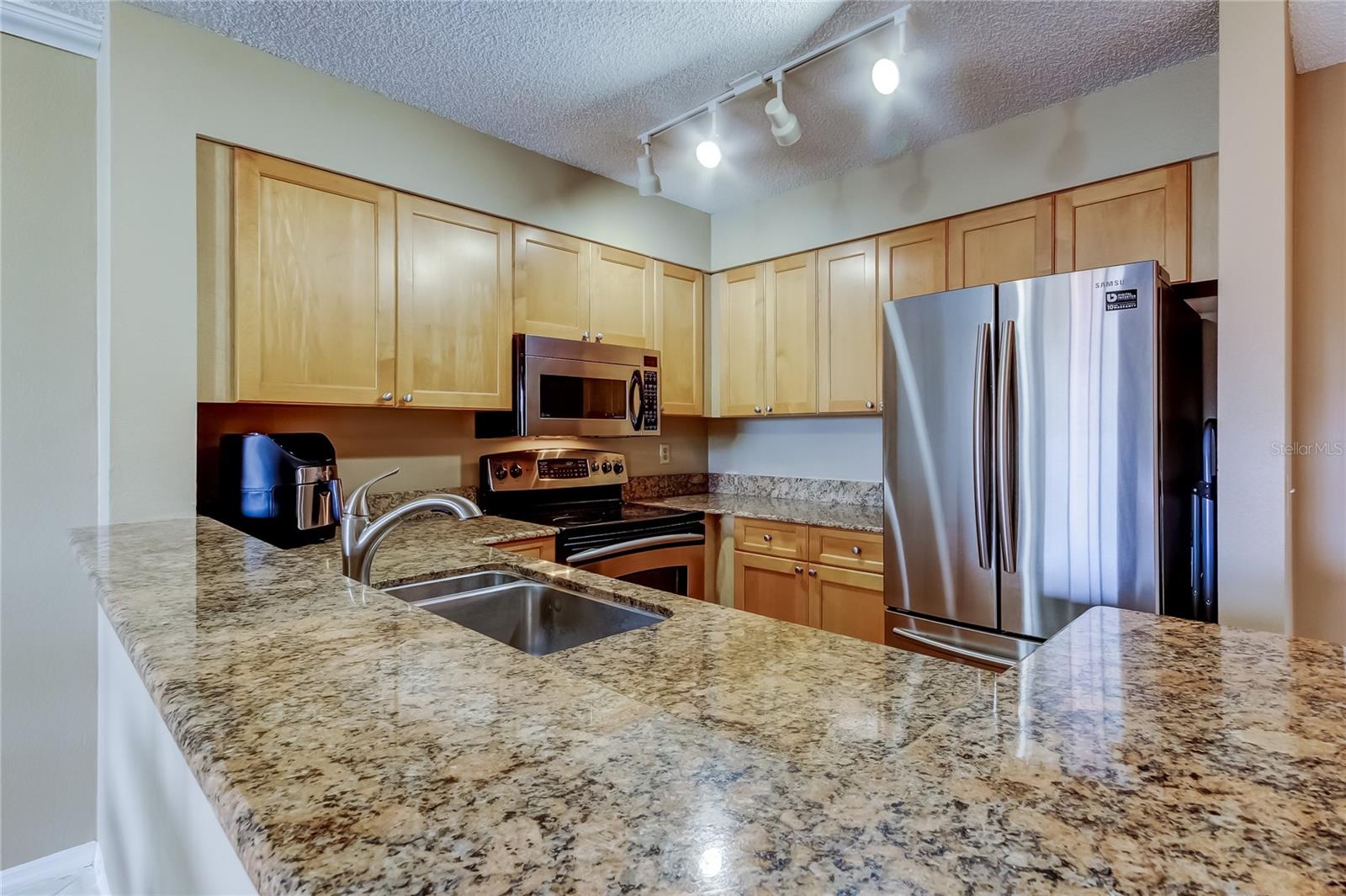 AUDUBON CONDO AT FEATHER SOUND - Residential