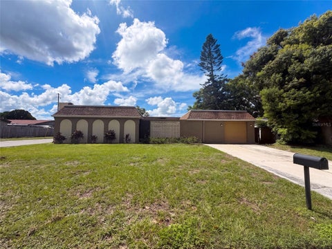 Photo of 5324 Reef Drive, New Port Richey, FL 34652 (MLS # O6439236)