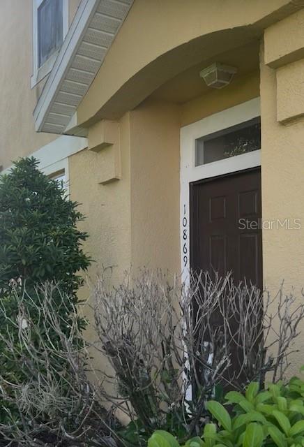Photo of 10869 Derringer Drive, Orlando, FL 32829 (MLS # O6444826)