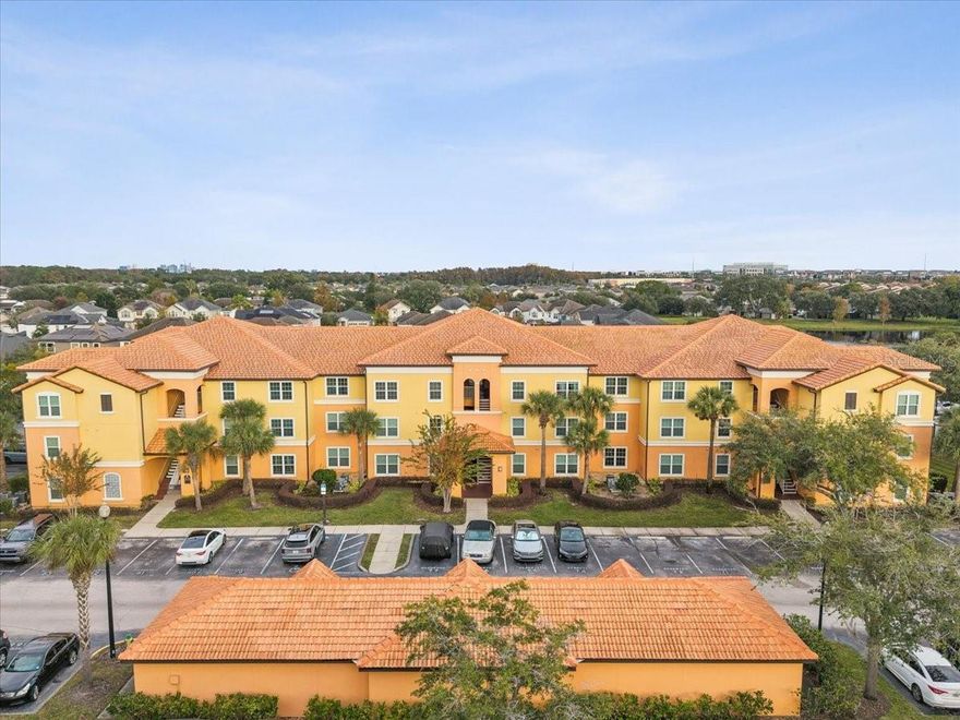 Move-in ready 2 bedroom, 2 bath top-floor condo in the gated Cypress Fairway community. This 3rd floor unit offers vaulted ceilings and no upstairs neighbors. The open floor plan flows from the dining area into a kitchen with cabinetry, a pantry, breakfast bar, full appliances and hardware, then into a family room and bright solarium ideal for a bonus room or home office. The owner’s suite sits off the living area and features a large walk-in closet and full bath with tub/shower combo; the guest bedroom is on the opposite side of the living area with ceiling fan and adjacent guest bath. Interior updates include new carpet, fresh neutral paint, mini-blinds and upgraded shower heads. In-unit laundry with washer, dryer and water heater adds convenience. The association has replaced the roof (2022), refreshed exterior stucco and paint, and upgraded to energy-efficient windows with added exterior wall insulation — helping improve energy efficiency. Residents enjoy community amenities including a clubhouse, fitness center, swimming pools, tennis courts, walking/jogging trails, playgrounds, picnic area with grills and gated access. One assigned parking spot is included plus ample guest parking. Ideally located minutes from I-4, the Turnpike, Sand Lake Road / International Drive dining and entertainment, and just over a mile from the upscale Mall at Millenia — this unit is well-suited for a primary residence or rental investment. Pet friendly (up to 2 pets; breed restrictions apply).