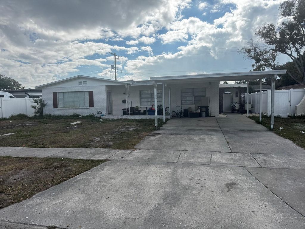 Photo of 7712 W Powhatan Ave, Tampa, FL 33615 (MLS # TB8461235)