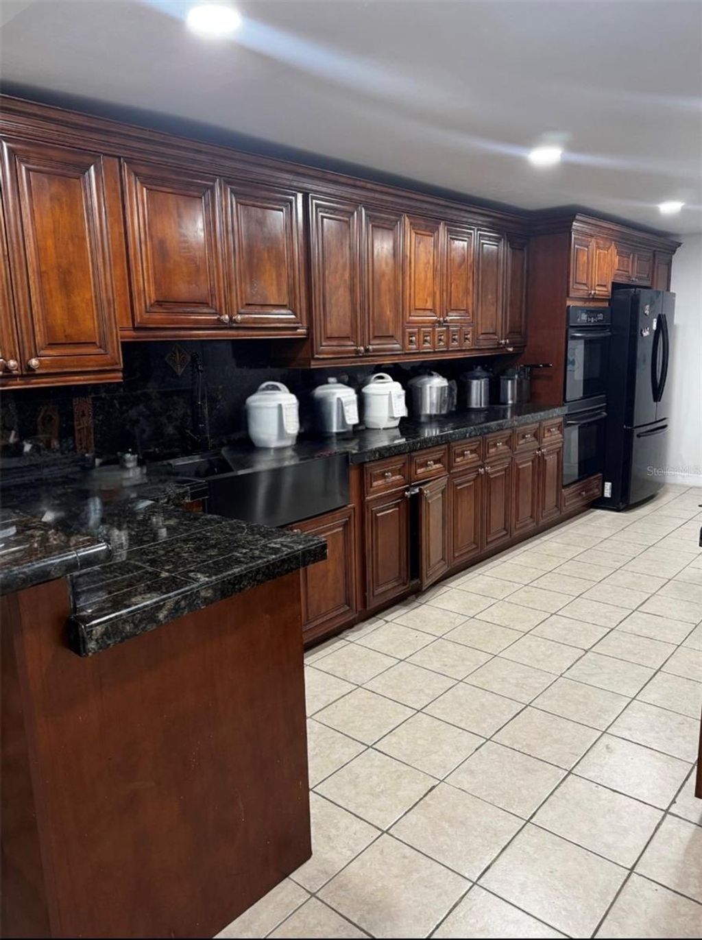 Photo of 7712 W Powhatan Ave, Tampa, FL 33615 (MLS # TB8461235)