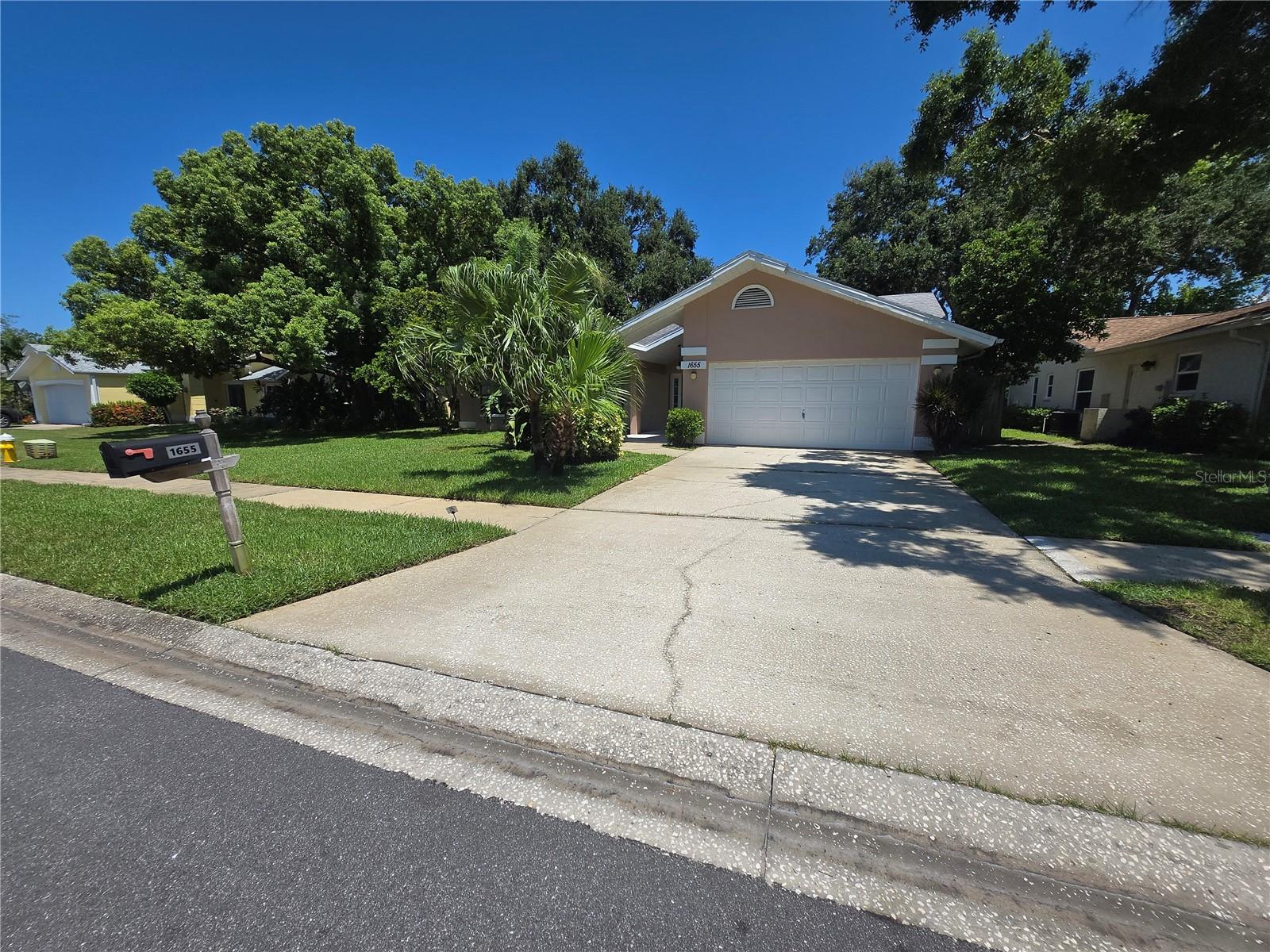 Welcome to your new home in Allen's Ridge. This large 3 bedroom 2 bath home has everything you are looking for. Enjoy the Beautiful mature landscaping with large fenced in yard that backs up to wooded conservation land. Updated kitchen with pass through windows to the screened in Florida room. Spectacular entry-way with built in bench storage and large coat closet along with intercom / AM/FM radio through out the entire house. Vaulted and cathedral ceilings are a plus. Stay warm by the wood burning fireplace and enjoy plenty of natural light from numerous skylights. Spacious inside laundry room with utility sink. Relax in your master bath with jetted spa tub and separate walk in shower with duel sinks. Large master walk in closet. This is a wonderful combination of split plan for bedrooms yet connected by living/ kitchen combo. Close to shopping and dining for your convenience.