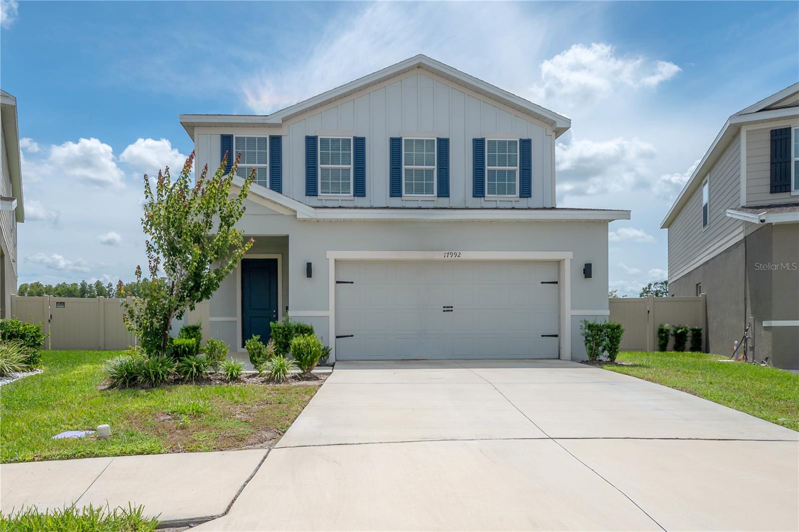 This modern home combines timeless appeal with thoughtful upgrades that elevate everyday living. Located in Cypress Preserve, it offers 4 bedrooms, 2.5 bathrooms, and over 2,300 sq ft of stylish living space. The redesigned stairwell opens the entryway, filling it with natural light and creating a bright, welcoming first impression. The open floor plan showcases a well designed kitchen with double ovens, flat-top stove, smart refrigerator, roll-out racks, and sleek black cabinet pulls, seamlessly connected to the dining and living areas. Unique touches include a custom wine nook and redesigned half bath. Upstairs, a versatile loft serves as a flexible bonus space, perfect for a home office, playroom, or additional lounge. The primary suite features dual walk-in closets with custom built-ins, a tray ceiling, and an ensuite bath with dual sinks and a walk-in shower. Additional highlights include ceiling fans, black hardware, updated plumbing and lighting fixtures, and finished garage floors with overhead storage. Set on an oversized cul-de-sac lot with a fenced yard and direct greenspace access, this home also offers resort-style amenities and a convenient location near major highways and shopping.