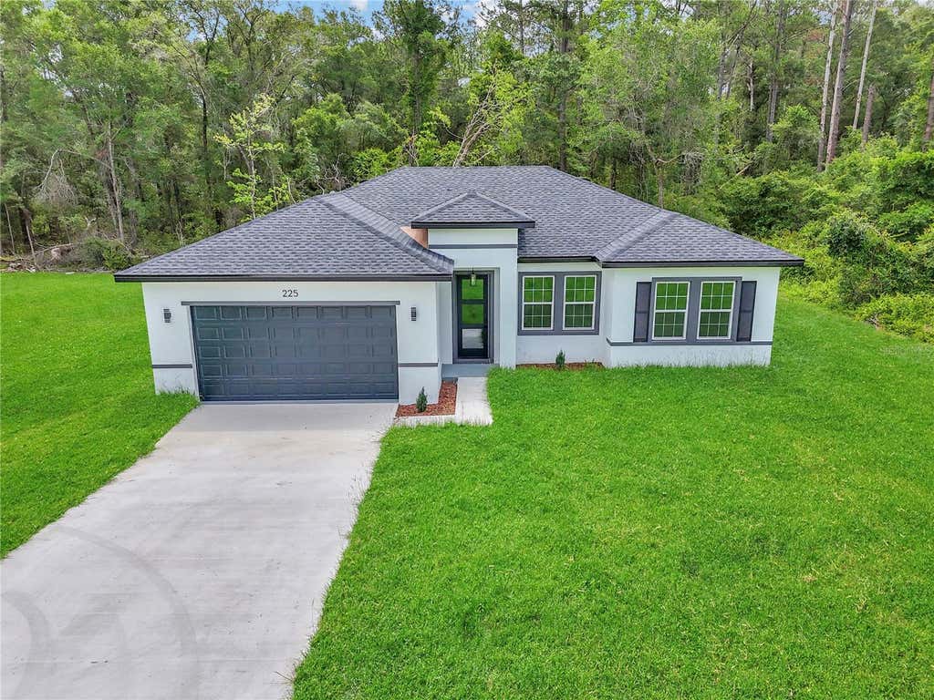 Photo of 225 E Caldwell Drive, Dunnellon, FL 34434 (MLS # O6414777)