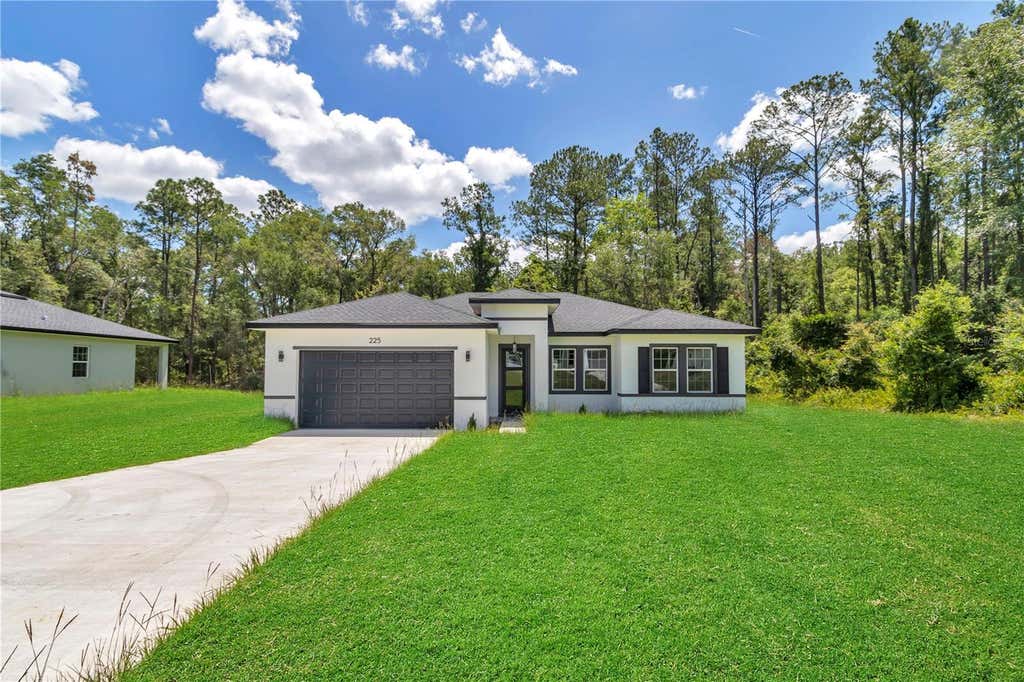 Photo of 225 E Caldwell Drive, Dunnellon, FL 34434 (MLS # O6414777)