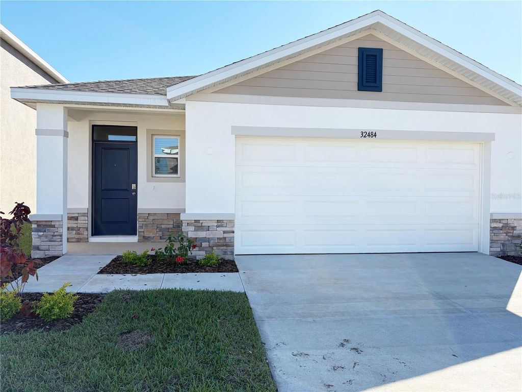 Photo of 32484 Weathered Oak Drive, Wesley Chapel, FL 33543 (MLS # J995042)