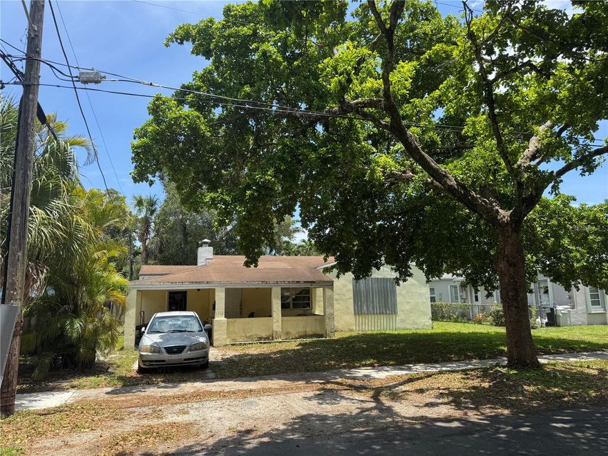 <LAST PRICE REDUCTION><HIGHEST & BEST BY 01/30/25> Investor Special! Single-Story Home with Carport, Huge Lot & Endless Potential – Minutes from the Beach!                                                                        
                                                         Here’s your chance to secure a high-upside property in a quiet, established neighborhood—just a short drive to the beach, shopping centers, restaurants, and more. Whether you're an investor seeking your next fix-and-flip or a savvy buyer looking to customize your future home, this 3-bedroom, 1-bath home offers the perfect blend of location, space, and potential.

                                                                                                                     Set on a generously sized lot, the home greets you with mature shade trees, a large front yard, and fantastic curb appeal. A covered front porch with attached carport offers a great place to relax and enjoy the breeze—while also providing convenient covered parking. The extra-long driveway adds even more space for vehicles, toys, or trailers. Inside, you’re welcomed by a spacious and cozy main living room with recessed lighting, ceiling fan, and tons of natural light. The open layout connects seamlessly to the dining area and a functional galley-style kitchen featuring solid wood cabinetry, original terrazzo floors, and recent sink upgrades. There’s ample storage and prep space, and the setup is ideal for light cosmetic upgrades or a full modern renovation.

                                                                                                                                                        Throughout the home, you’ll find elegant terrazzo flooring and plush carpeting in the bedrooms. All rooms are generously sized with walk-in closets, and the bathroom features a deep soaking tub with timeless tile, a spacious vanity, updated lighting, and large windows that bring in natural light. A little cosmetic TLC will go a long way in creating a sleek, spa-like finish.

                                                                                                                      The enclosed front porch area also includes a convenient laundry space, and out back, you’ll find a massive backyard with lush greenery and endless room for gardening, pets, entertaining, or even a pool. The large shed is ideal for tool storage, hobby use, or a small workshop setup.

                                                                                                                     The A/C system (approx. 2009) recently stopped working and may need replacement, and the roof—also from 2009—shows age but has served the home well. Electrical and plumbing are in good working condition. Due to the roof and A/C, this will likely need to be a cash-only purchase.

                                                                                                                                                     With no HOA and no rental restrictions, this is a rare opportunity to add serious value and unlock long-term income or equity. Fix and flip, renovate and hold, or personalize as a forever home—whatever your vision, this property delivers the bones and the location to make it happen. Schedule your private showing today and bring this high-potential Palm Beach-area property to life! <NO ASSIGNABLE CONTRACTS>