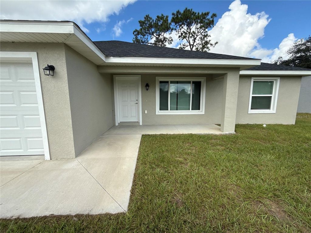 Photo of 26 Malauka Circle, Ocklawaha, FL 32179 (MLS # O6362467)