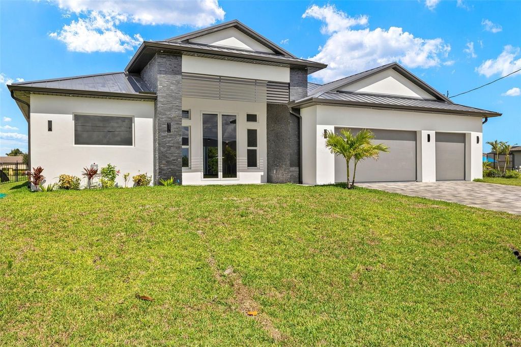 Photo of 816 NW 39th Avenue, Cape Coral, FL 33993 (MLS # C7511488)