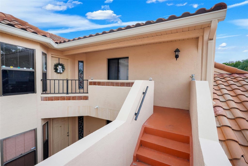 Photo of 7661 Sugar Bend Drive #7661, Orlando, FL 32819 (MLS # OM731646)