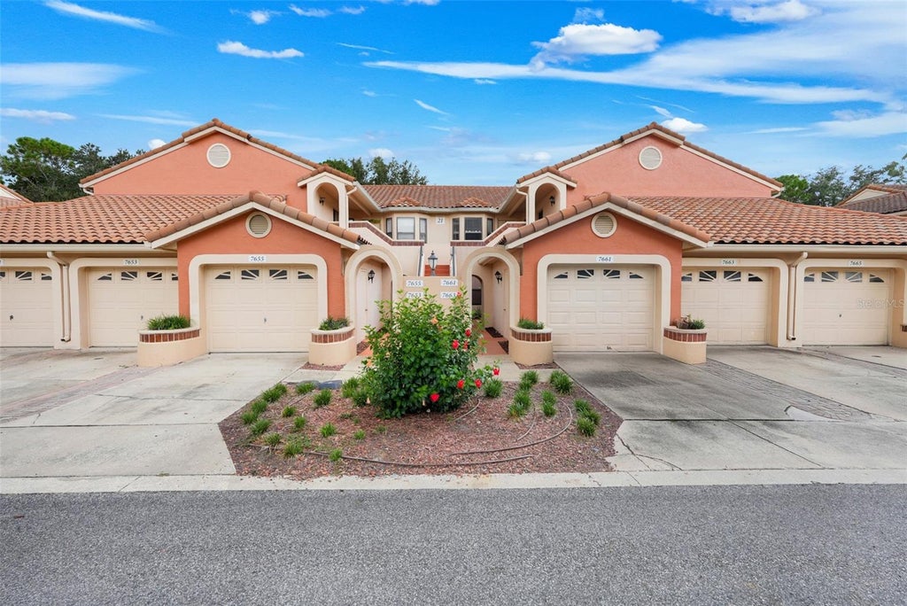Photo of 7661 Sugar Bend Drive #7661, Orlando, FL 32819 (MLS # OM731646)
