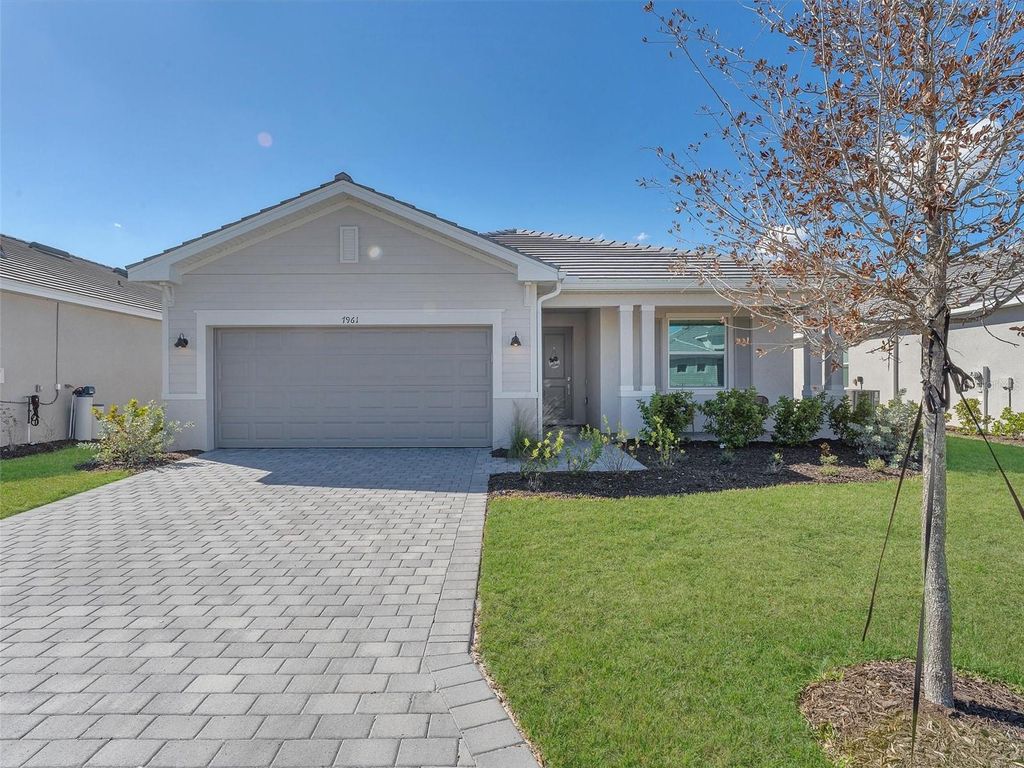 Photo of 7961 Lakes Edge Lane, Port Charlotte, FL 33981 (MLS # O6374940)