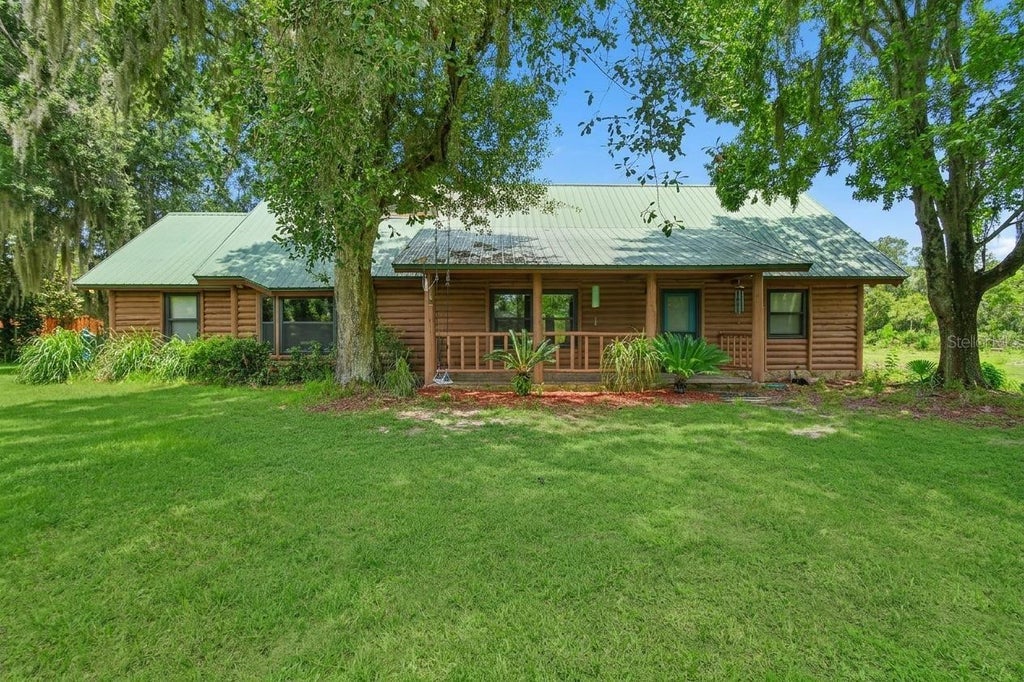 Photo of 698 Wild Acres Road, Osteen, FL 32764 (MLS # V4951263)