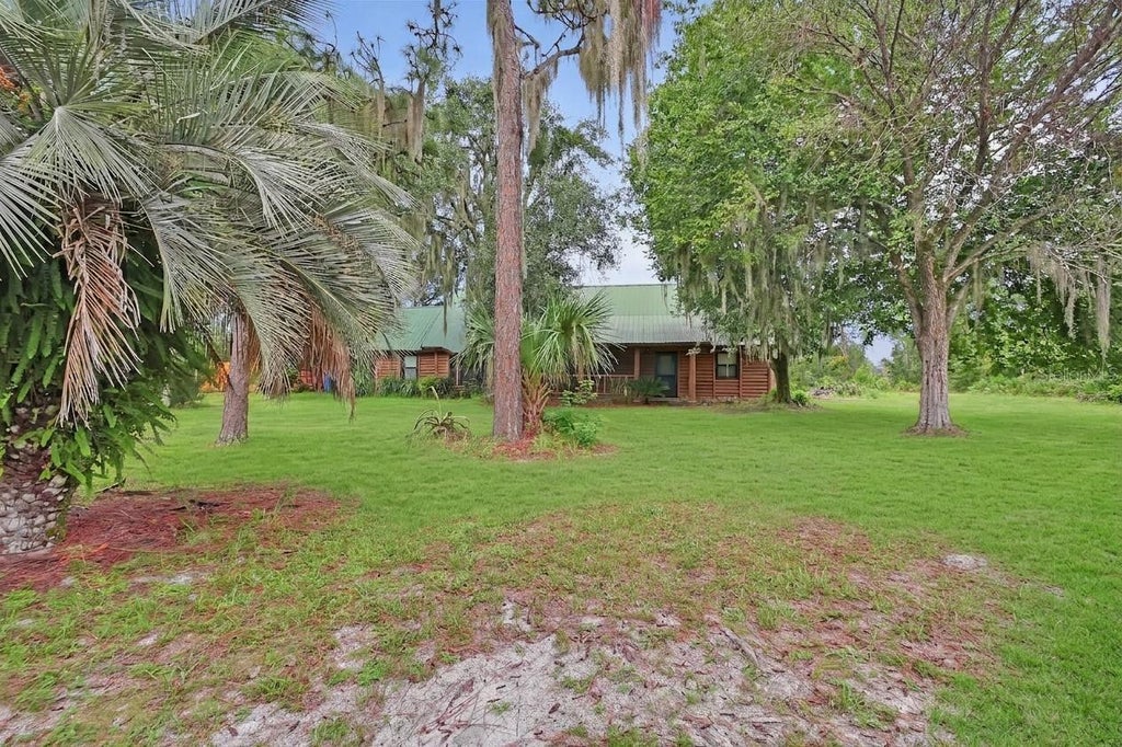 Photo of 698 Wild Acres Road, Osteen, FL 32764 (MLS # V4951263)