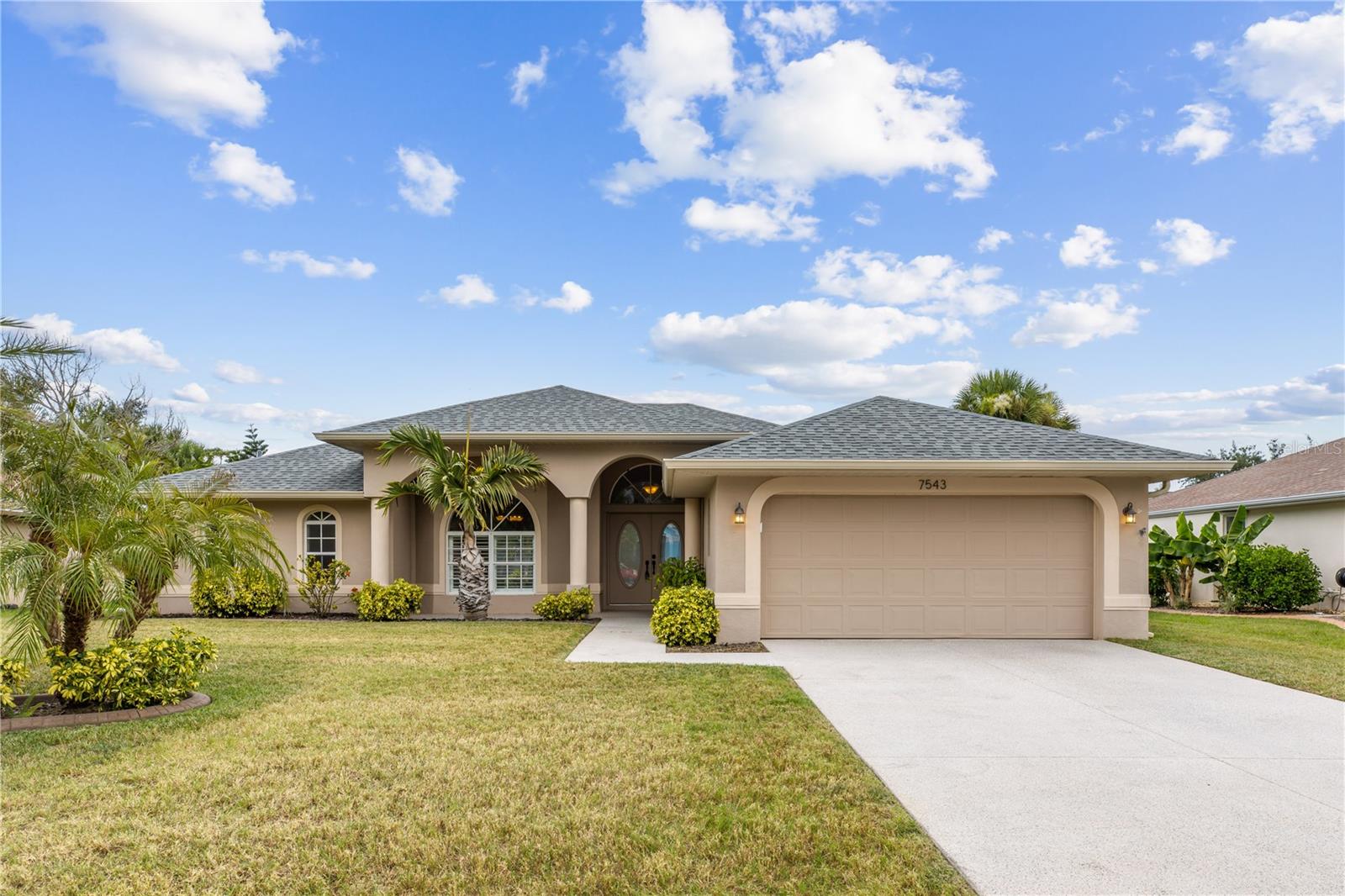 One or more photo(s) has been virtually staged. SPACIOUS 3 Bedroom, 2.5 Bathroom, 2 Car Garage, Pool home with a family room located in the Burnt Store Meadows community. LOW HOA FEES & NO FLOOD INSURANCE REQUIRED! CLICK ON THE VIRTUAL TOUR LINK 1 FOR THE VIDEO AND VIRTUAL LINK 2 FOR THE 3D TOUR. Featuring a bright & open floor plan, high vaulted ceilings, tile flooring throughout, and MUCH MORE! Host friends and family with ease in the open living and dining area, thoughtfully designed for seamless indoor-outdoor entertaining, featuring a large pocket slider that opens fully to the lanai. The kitchen offers ALL Stainless-steel appliances, granite countertops & backsplash, a closet pantry, plenty of cabinets for storage, a breakfast bar and a dinette with a glass slider to the lanai. Off the kitchen is the family room, perfect for expanding your living and entertaining space, with a large window and a glass slider to the lanai, for plenty of natural lighting. A generous master suite has a glass slider to the lanai, DUAL walk-in closets, and a private en-suite bathroom with a dual sink vanity, walk-in shower, and water closet. The guest bedrooms are on a split floor plan, providing plenty of privacy, with built-in closets and a shared guest bathroom with a walk-in shower nearby. Start your day with a peaceful cup of coffee or unwind in the evening with your favorite beverage on the spacious lanai, offering plenty of room for entertaining and overlooking a serene, park-like setting. The heated pool allows for year-round enjoyment, while the generously sized pool deck is ideal for soaking up the Florida sunshine. A convenient half bathroom is located just off the lanai, along with a private outdoor shower—perfect for rinsing off after a swim or enjoying the true Florida lifestyle. 2022 ROOF - 2024 A/C - NEWER POOL PUMP & HEATER - NEWER POOL CAGE - LUSH LANDSCAPING. Burnt Store Meadows is conveniently located near local favorites such as Fisherman's Village, Ponce De Leon Park, shopping & boutiques, fine & casual dining, and LIVE entertainment. MINUTES to US-41 and I-75. Schedule your showing TODAY!!!