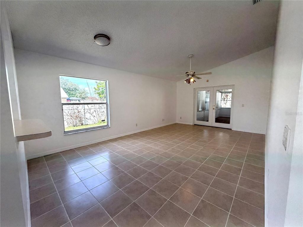 Photo of 9176 Fort Jefferson Boulevard, Orlando, FL 32822 (MLS # O6398711)