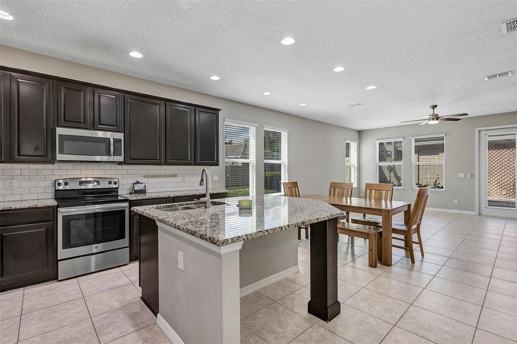 Photo of 7644 Ripplepointe Way, Windermere, FL 34786 (MLS # O6395582)