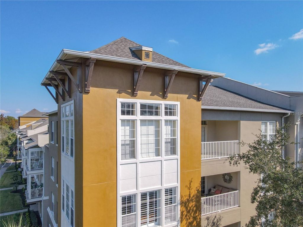Photo of 1411 Celebration Avenue #406, Kissimmee, FL 34747 (MLS # A4672649)