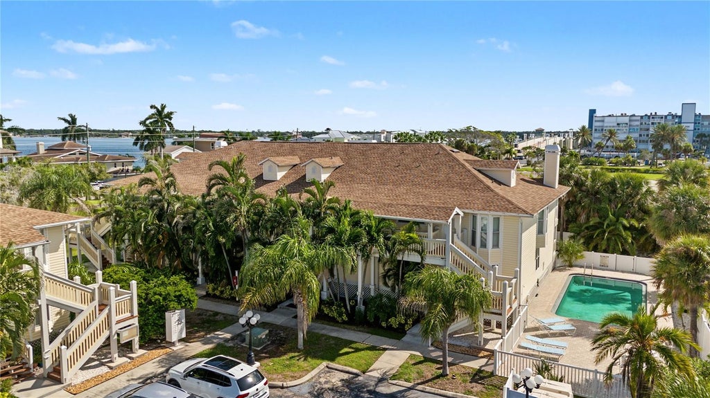 Photo of 10399 Paradise Boulevard #107, Treasure Island, FL 33706 (MLS # TB8555167)