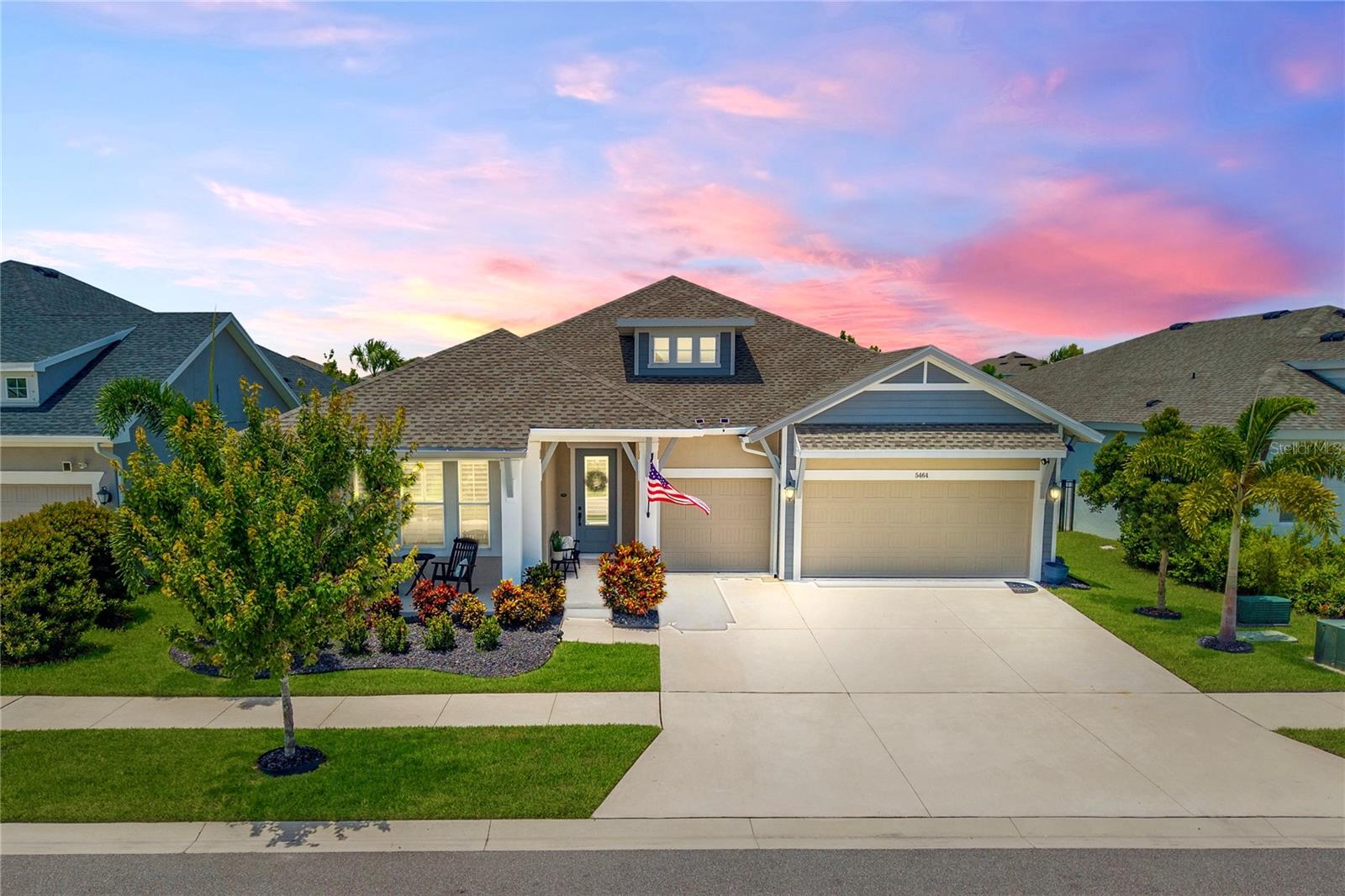 Welcome to 5464 Wayfarer Ave, a stunning David Weekley home nestled in the highly sought-after Waterset community of Apollo Beach. Built in late 2022, this meticulously maintained 4-bedroom, 3-bathroom, 3-car garage home offers 2,545 square feet of modern living space with a thoughtful layout and luxurious finishes throughout. Step outside to your private backyard retreat featuring a large saltwater heated pool with an expansive sunshelf, all enclosed under an extra-large screened lanai with elegant travertine decking—designed to stay cool underfoot even on the hottest Florida days. Lush landscaping and a fully fenced yard provide added privacy, making this the perfect space to relax or entertain.
Inside, you'll find a grand kitchen that opens seamlessly to the living and dining areas, creating a perfect hub for everyday living and gatherings. The kitchen features quartz countertops, a gas stove with a sleek range hood, built-in oven and microwave, and custom pull-out shelving in both the kitchen and the spacious primary bathroom. Other premium upgrades include luxury vinyl flooring throughout (no carpet anywhere), motorized window shades on the sliding glass doors, custom composite shutters, a water softener with purifier, and a full sprinkler system.
Waterset is a vibrant, sidewalk-lined community offering four resort-style pools—including Olympic-style lap pools and thrilling waterslides—along with playgrounds, walking trails, and fitness facilities. Families will love the proximity to excellent local schools such as Waterset Charter School, Dorothy C. York Innovation Academy Magnet, and Southshore Montessori, along with nearby public options including Apollo Beach Elementary, Doby Elementary, Eisenhower Middle School, and East Bay High School.
Conveniently located just 6 minutes to Publix, 8 minutes to Tampa General Hospital Urgent Care, and 15 minutes to the sandy shores of Apollo Beach, with several marinas within a short drive, this home offers the perfect combination of luxury, community, and coastal lifestyle. Don’t miss the opportunity to make this beautiful property your forever home.