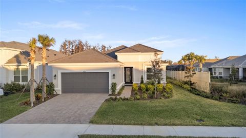 Photo of 4618 Isonzo Way, Wesley Chapel, FL 33543 (MLS # TB8466861)