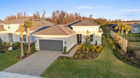 Photo of 4618 Isonzo Way, Wesley Chapel, FL 33543 (MLS # TB8466861)