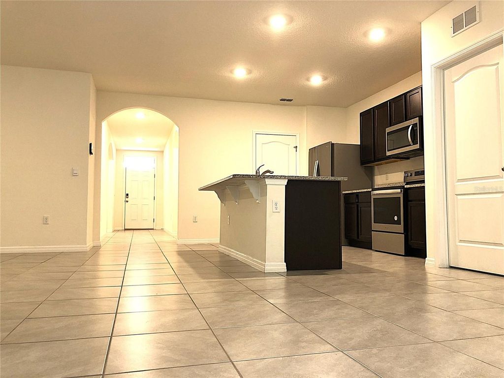 Photo of 518 Noble Avenue, Davenport, FL 33837 (MLS # O6378817)