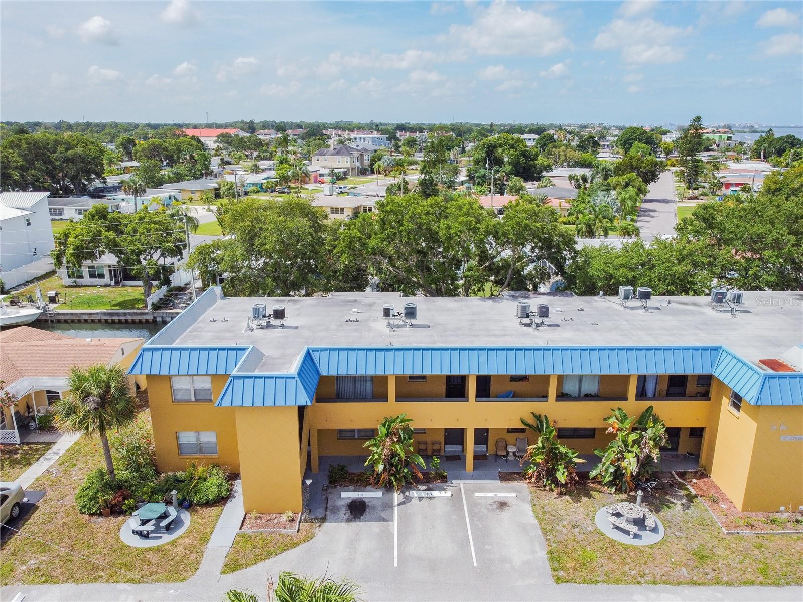LOCATION, LOCATION, LOCATION! Great coastal neighborhood with many local restaurants, shopping, and groceries. Enjoy easy access to Honeymoon Island State Park, Downtown Dunedin, the Pinellas Trail, and more! This second-floor condo offers 2 bedrooms, and 1 full bathroom, with canal views from the bedroom and the living room. The Dining Room and Living Room are open concepts. The building offers two laundry rooms with access to machines. This is a turnkey condo, already furnished and equipped for short term vacation rentals or your very own beach condo. Recent updates include new flooring and fresh paint.