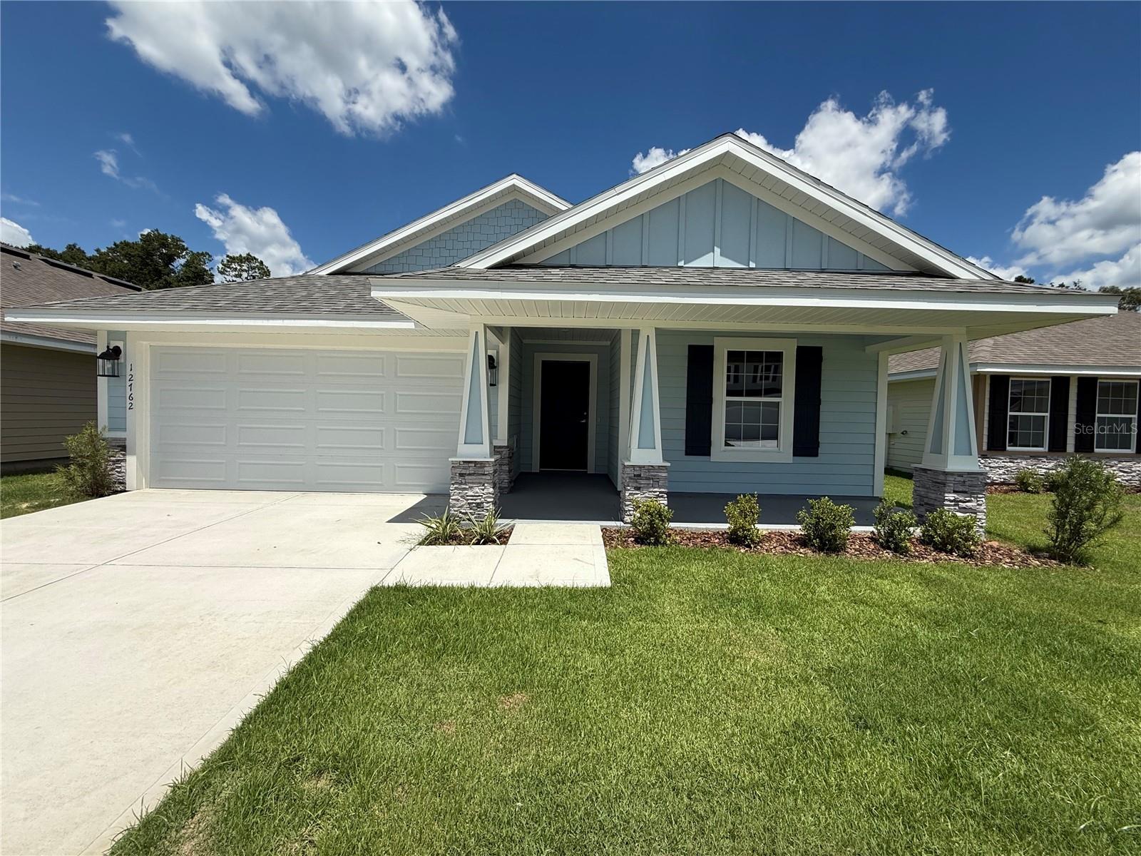 Seller concessions include a special finance rate of 4.99%. The rate applies to builders' preferred lender, Acrisure Mortgage, which utilizes FHA, VA, USDA, conventional loans, or up to $20,000 towards closing costs. SAVANNAH STATION A, FL, is a quiet, country-like area close to all your shopping needs—Three-bedroom, two-bath MOVE IN READY, 1512 SQFT. LOT 254 has hardy siding, stacked stone accents on the exterior, and a large front porch. Great location close to Gainesville, Alachua, and Lake City. It features LVP in the wet areas and throughout the main home, excluding the bedrooms, dining room, family room, and a leading area out to the backyard with a new fence. The spacious primary suite features a double-door closet, a granite double-sink vanity, a walk-in shower, and a garden Tub. The kitchen area features a large granite island that overlooks the Family room. This prominent kitchen features upgraded cabinets, granite countertops, a stainless steel Frigidaire appliance, a range, a dishwasher, a microwave, and a disposal. Brushed Nickel Faucets, LED lighting, and a Built-in pest defense system. Energy-efficient HVAC system. Taxes are based solely on land taxes. Prices are subject to change without notice.