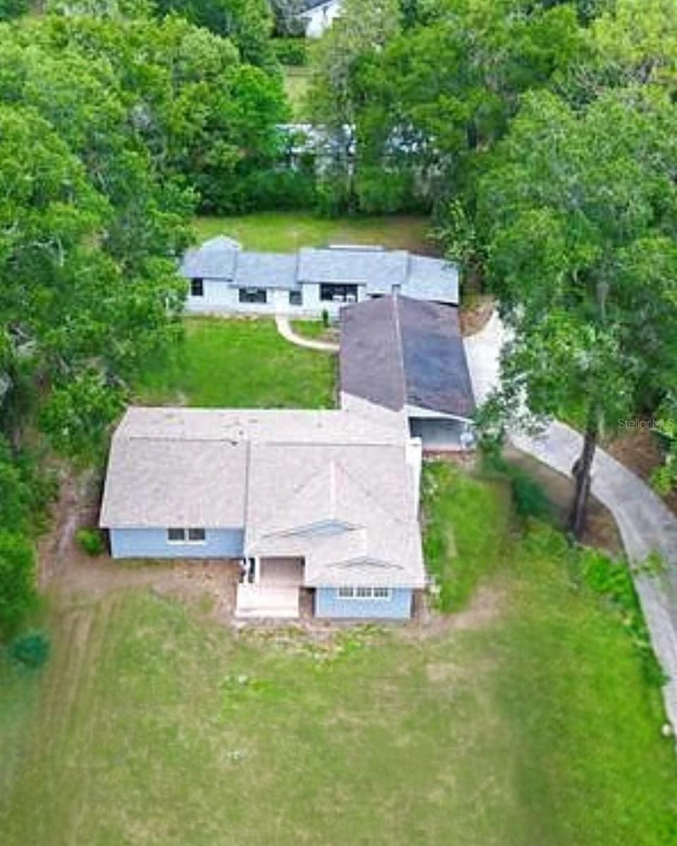 A truly RARE OPPORTUNITY TO RENT TWO HOMES ON ONE PROPERTY!—YOU CAN RENT ONE HOME OR BOTH TOGETHER!! This beautiful dual residence estate sits on just over an acre of private land down a quiet street in a peaceful and convenient part of Ocala. Perfect for families or anyone seeking extra space, it combines comfort, accessibility, and a welcoming community atmosphere.
The larger home includes 3 spacious bedrooms, 2 bathrooms, and generous living areas.
Both homes share a parking area that fits up to 4 vehicles, and the expansive lot provides plenty of outdoor space for relaxation, entertaining, or enjoying the Florida lifestyle.
Prime location, Families who want extra space, Minutes to shopping, dining, and entertainment. Schedule your showing today!