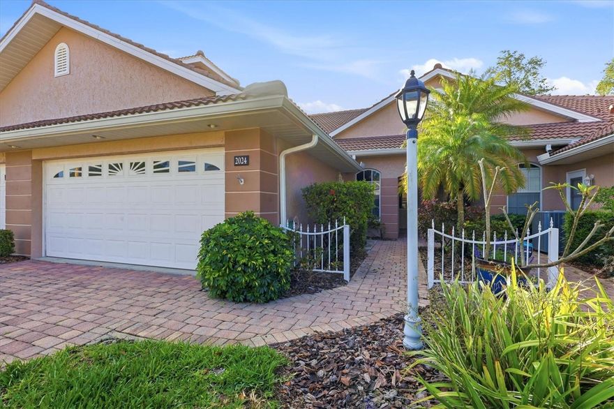 Welcome to refined, low-maintenance living in one of North Port’s desirable gated villa communities. This beautifully updated residence offers the perfect blend of elegance, comfort, and resort-style amenities, all just a few doors from the villa pool and clubhouse. From the moment you arrive, the paver driveway and walkway set the tone for the quality found throughout the home.
Inside, you’ll find a thoughtfully enhanced interior featuring newly painted walls and exterior surfaces, granite countertops, recessed kitchen lighting, updated ceiling fans, and a spacious pantry that adds both style and function. Major improvements provide peace of mind, including a new roof, newer hot water tank. The spacious layout with 11 foot ceilings also includes a full-size washer and dryer, a generous 2-car garage, and an enclosed lanai with windows, creating a versatile all-weather room perfect for relaxing or entertaining year-round.
Residents enjoy an exceptional lifestyle with access to a fitness center, two sparkling pools, pickleball, tennis, and an inviting clubhouse, all within a secure gated setting. This is a rare opportunity to enjoy carefree Florida living with upscale touches and outstanding community amenities in a prime North Port location.